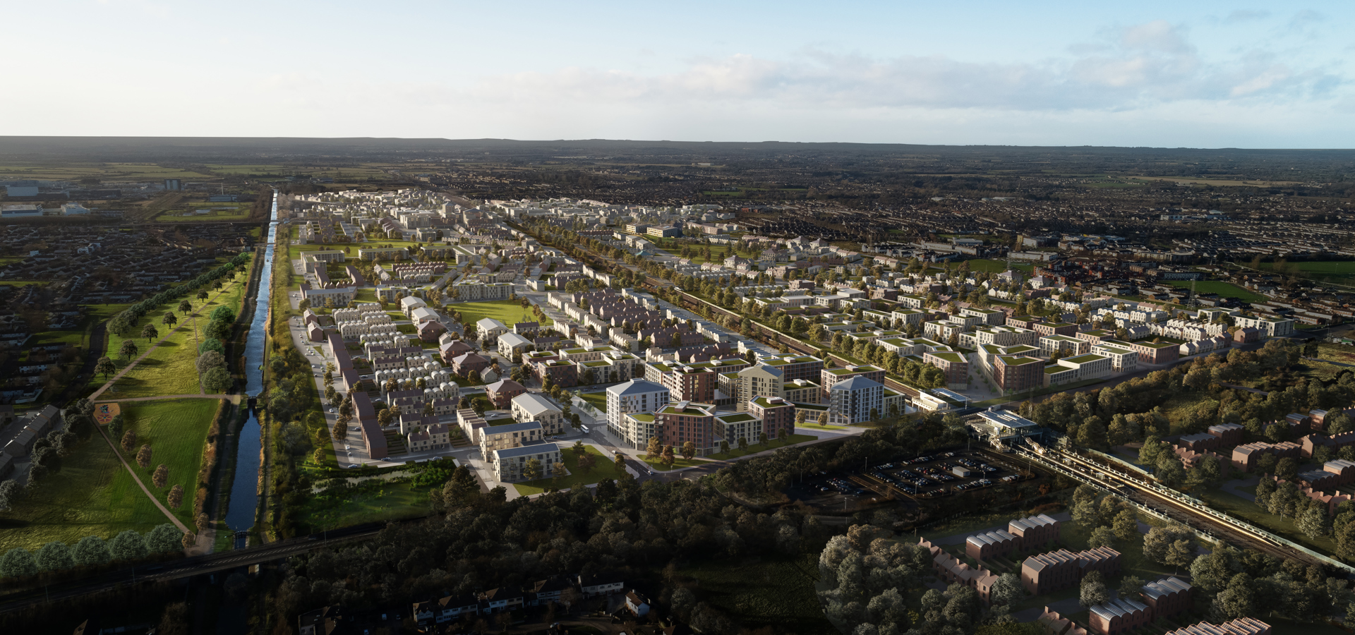 Aerial view over Clonburris with a wide green park corridor running through the housing