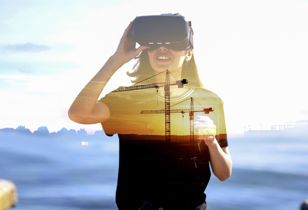 Woman wearing a VR headset, double-exposed with a crane at sunset
