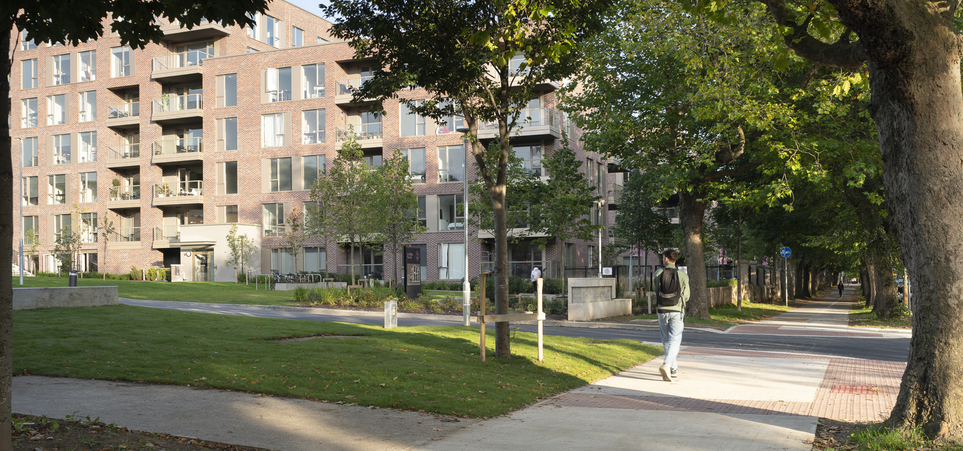 Griffith Wood apartments seen across a lawn with mature trees