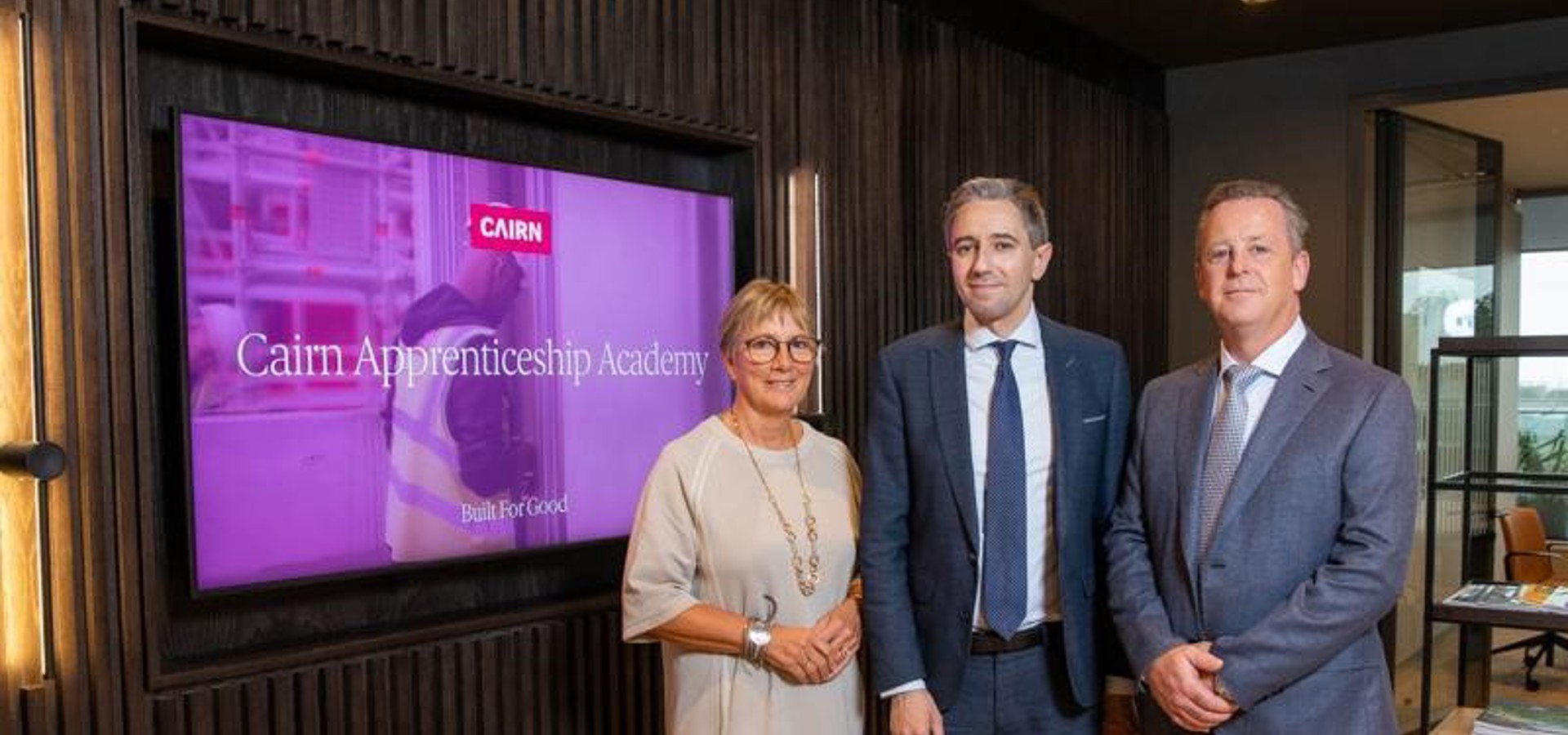 Three people at the launch of the Cairn Apprenticeship Academy